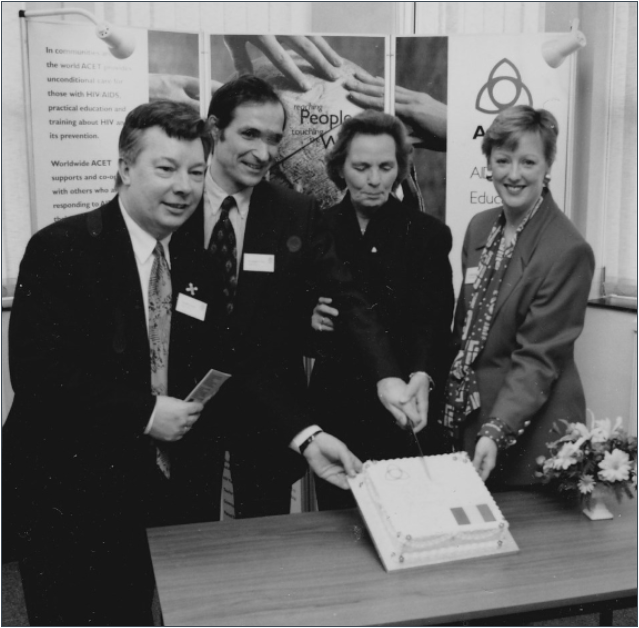Gerald, Patrick (acet UK founder) Queen Anne of Romania and Pat - with an ACET Romania cake
