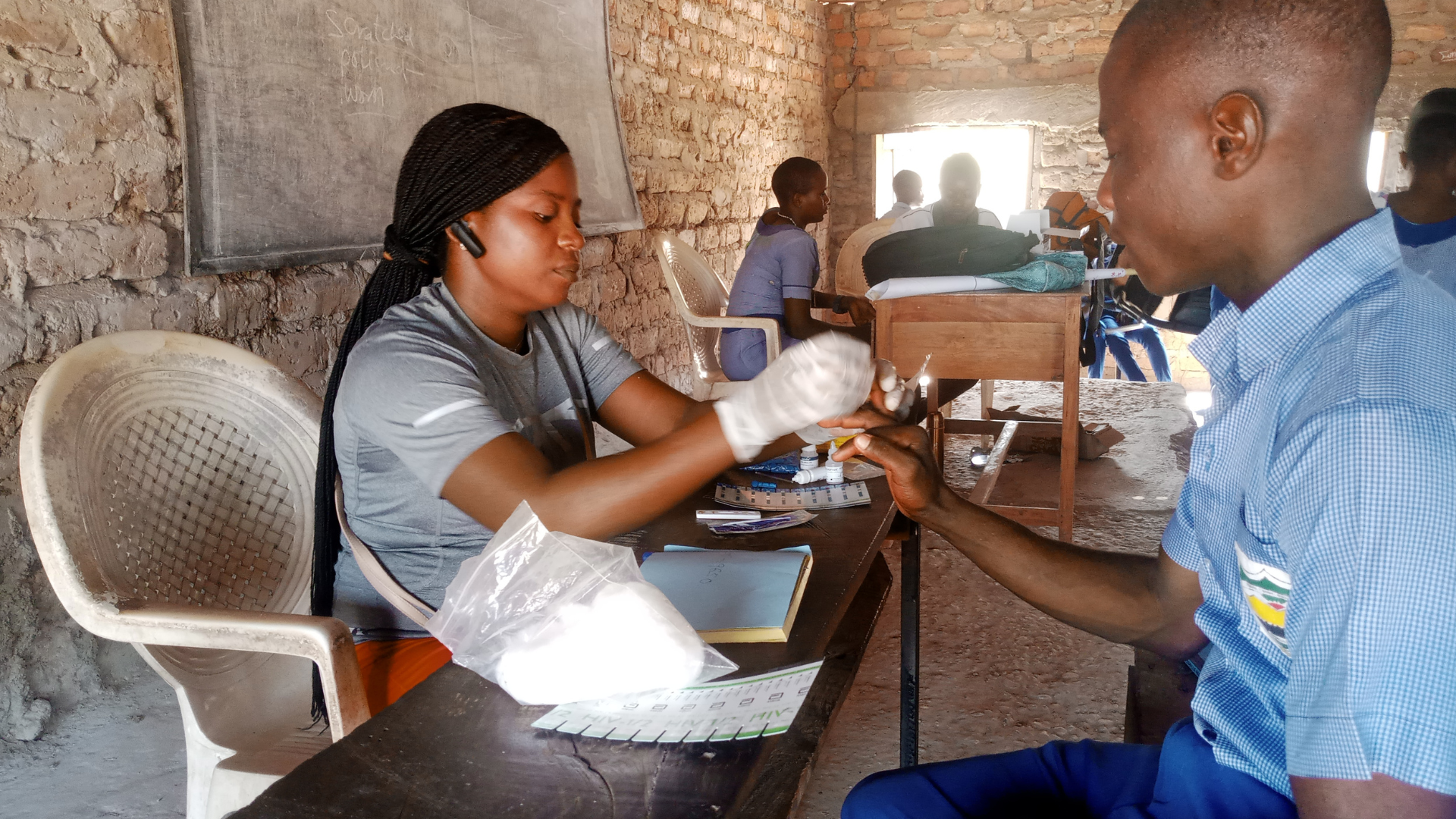 School student having an HIV test
