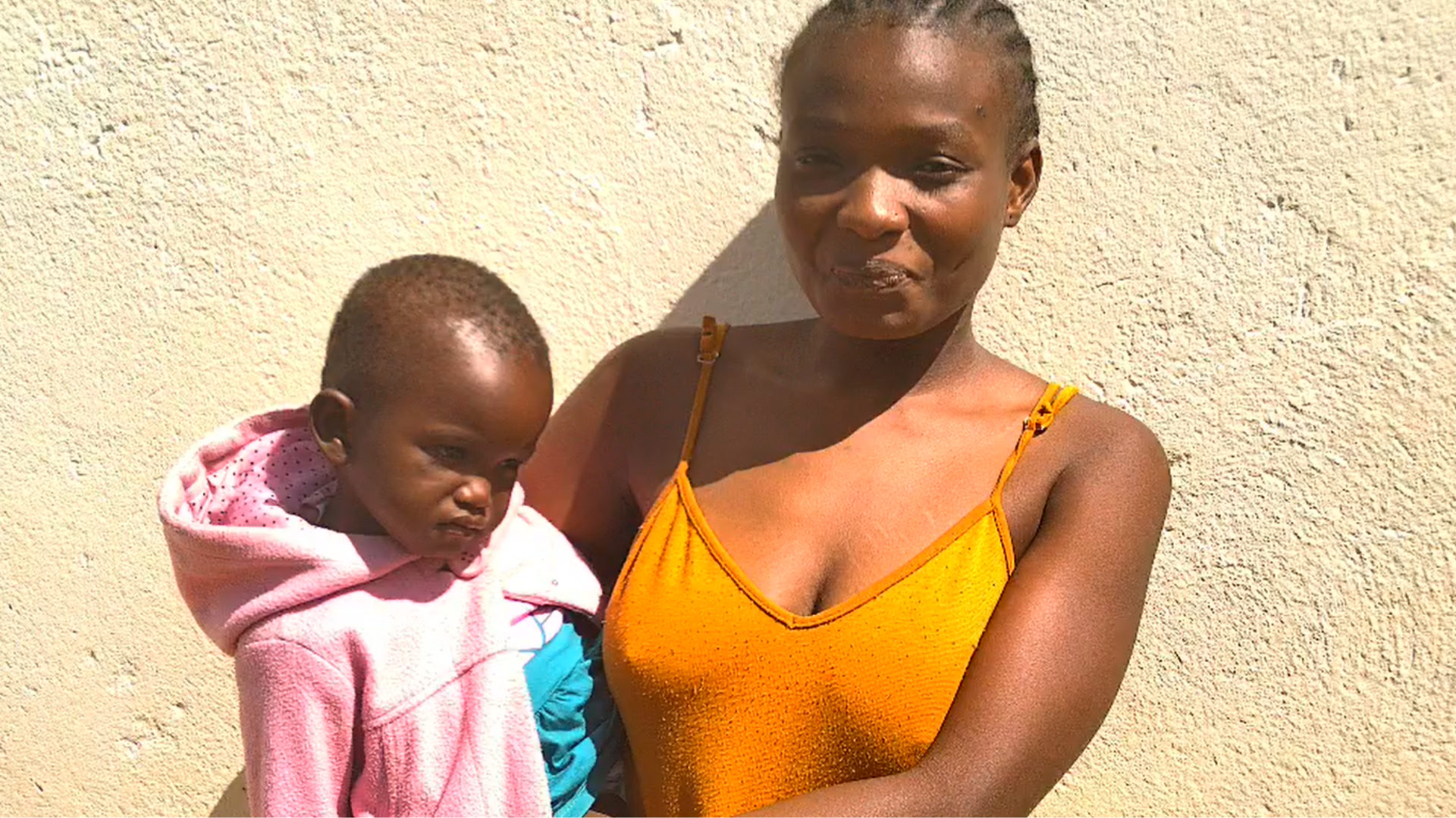 Unashe with her child